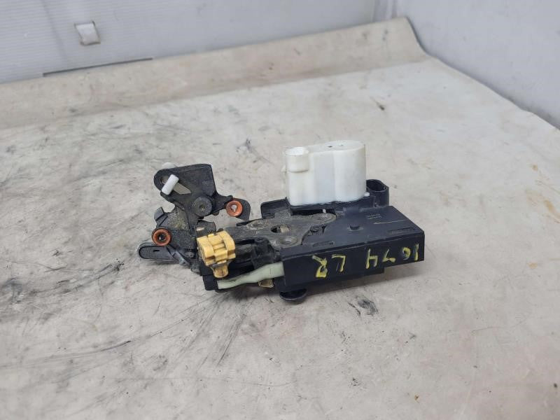 2005 ESCALADE LH DRIVER REAR DOOR LATCH LOCK ACTUA 1128 - image 1