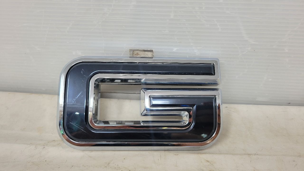 2023 SIERDEN15 "G" FROM GMC FRONT GRILLE EMBLEM 29767 - image 1