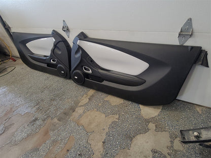 2014 CAMARO DOOR PANELS PAIR BLACK W/WHITE TRIM 33570 - image 2