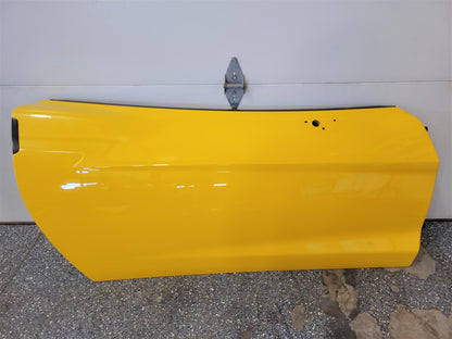 2005 CORVETTE RH PASSENGER DOOR. MILLENIUM YELLOW PAINT CODE 79U / 5593 SMALL 3/8" PAINT CHIP ON FRONT EDGE AS PICTURED 34037 - image 1