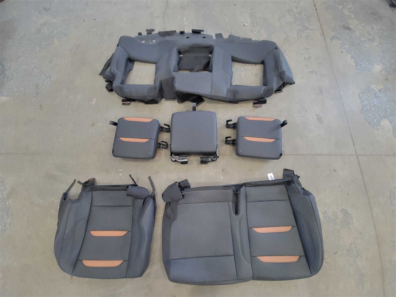 2023 SIERRA REAR AT4 SEAT COVERS BLACK WITH KALAHARI ACCENTS 34487 - image 1