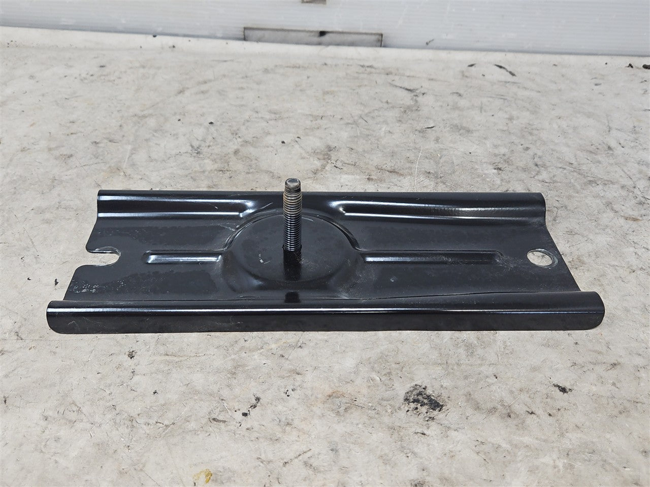 Used OEM 2010-2015 CAMARO BATTERY HOLD DOWN TOP BRACKET 22765899, actual item photo 1