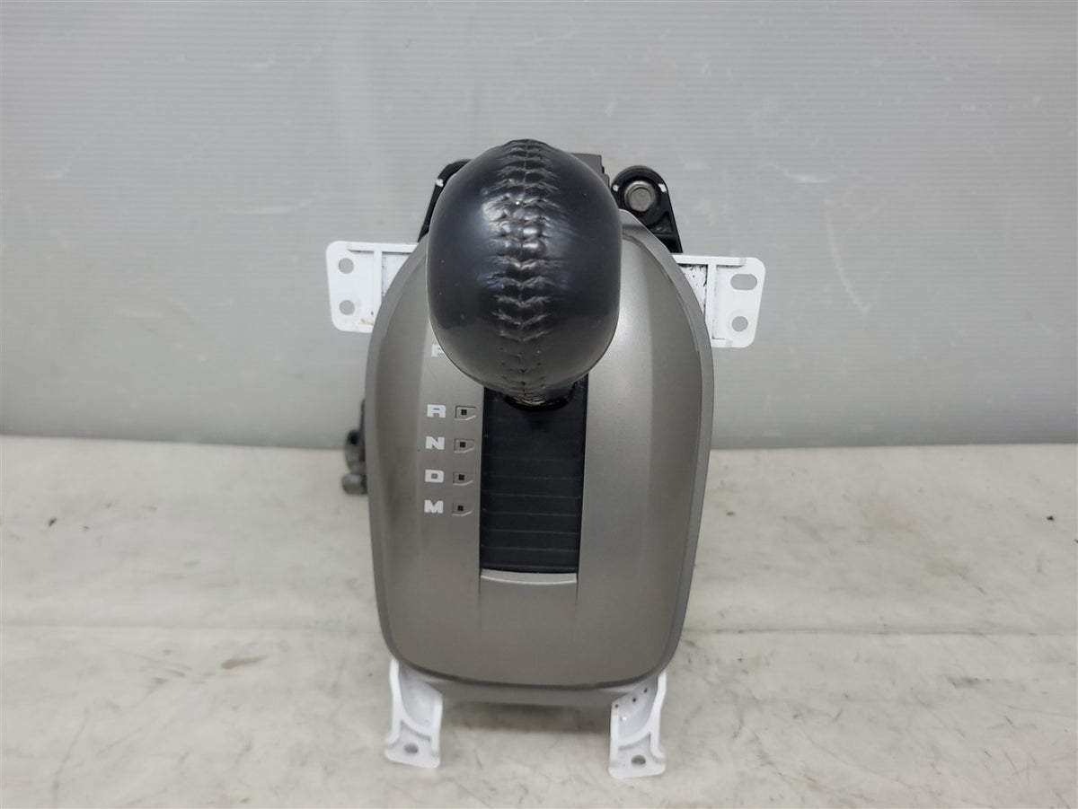 Used OEM 2010-2015 CAMARO AUTOMATIC FLOOR SHIFTER ASSEMBLY WITH TRIM, actual item photo 1