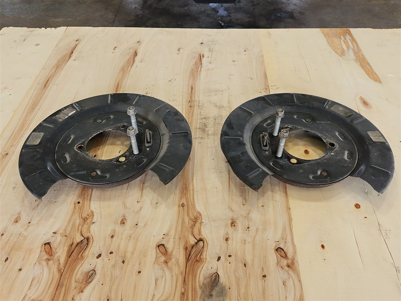 Used OEM 2010-2015 CAMARO SS REAR PARK BRAKE BACKING PLATES PAIR, actual item photo 1
