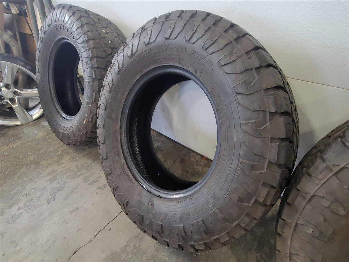 Used OEM TOYO OPEN COUNTRY A/T III 295/70R18 SET OF 4 TIRES 16/32, actual item photo 11