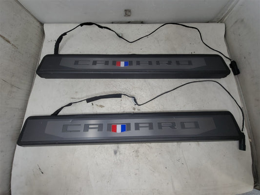 Used OEM 2016-2024 CAMARO LIGHTED DOOR SILL TRIM SCUFF PLATES PAIR, actual item photo 1