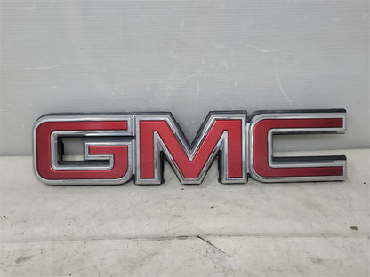 Used OEM 2014-2019 SIERRA FRONT GRILLE GMC LOGO EMBLEM RED WITH, actual item photo 1
