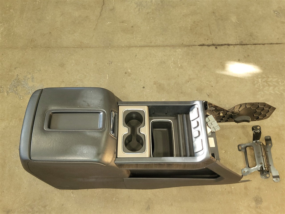 Used OEM 2014-2015 SIERRA SILVERADO FRONT CENTER CONSOLE DENALI BLACK, actual item photo 1
